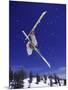 Low Angle View of a Skier in Mid Air-null-Mounted Photographic Print