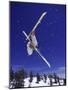 Low Angle View of a Skier in Mid Air-null-Mounted Photographic Print