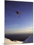 Low Angle View of a Skier in Mid Air-null-Mounted Photographic Print