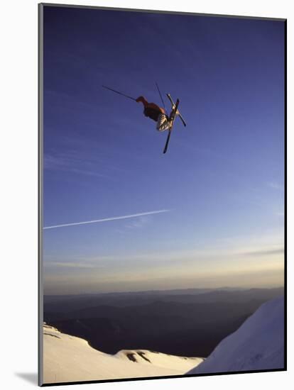 Low Angle View of a Skier in Mid Air-null-Mounted Photographic Print