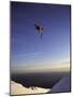 Low Angle View of a Skier in Mid Air-null-Mounted Photographic Print