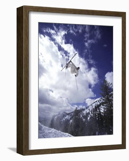 Low Angle View of a Skier in Mid Air-null-Framed Photographic Print