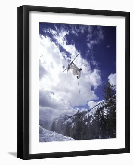 Low Angle View of a Skier in Mid Air-null-Framed Photographic Print