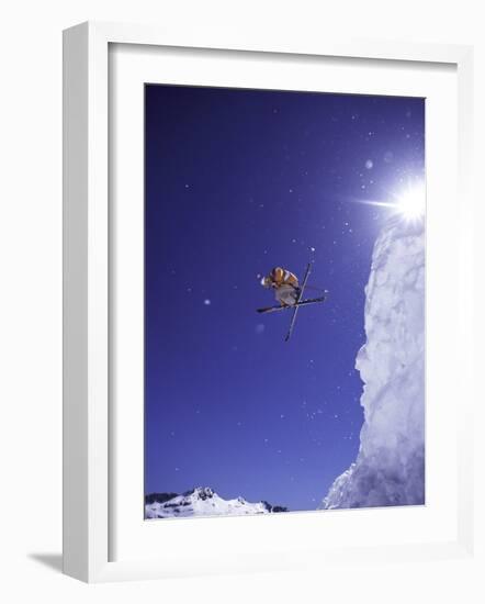 Low Angle View of a Skier in Mid Air-null-Framed Photographic Print