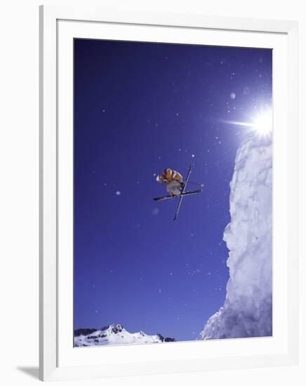 Low Angle View of a Skier in Mid Air-null-Framed Photographic Print