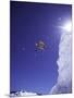 Low Angle View of a Skier in Mid Air-null-Mounted Photographic Print