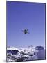 Low Angle View of a Skier in Mid Air-null-Mounted Photographic Print