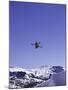 Low Angle View of a Skier in Mid Air-null-Mounted Photographic Print