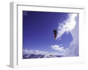 Low Angle View of a Skier in Mid Air-null-Framed Photographic Print