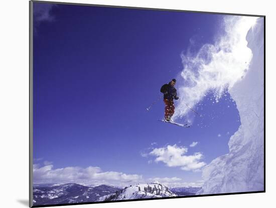 Low Angle View of a Skier in Mid Air-null-Mounted Photographic Print