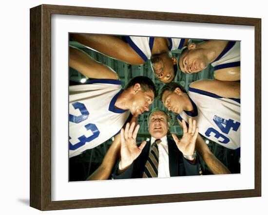 Low Angle View of a Team and Their Coach in a Huddle-null-Framed Premium Photographic Print