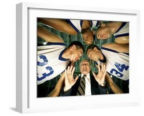 Low Angle View of a Team and Their Coach in a Huddle-null-Framed Premium Photographic Print