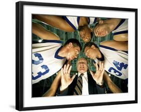 Low Angle View of a Team and Their Coach in a Huddle-null-Framed Photographic Print
