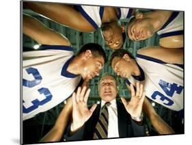 Low Angle View of a Team and Their Coach in a Huddle-null-Mounted Photographic Print