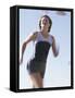Low Angle View of a Woman Running-null-Framed Stretched Canvas