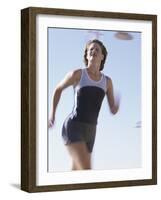 Low Angle View of a Woman Running-null-Framed Photographic Print