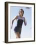 Low Angle View of a Woman Running-null-Framed Photographic Print