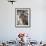 Low Angle View of a Young Man Checking the Plumbing with a Flashlight-null-Framed Photographic Print displayed on a wall