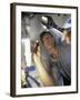 Low Angle View of a Young Man Checking the Plumbing with a Flashlight-null-Framed Photographic Print