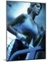 Low Angle View of a Young Woman Running on a Treadmill-null-Mounted Photographic Print