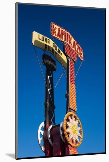 Low angle view of amusement park sign, Eilat, Negev, Red Sea, Israel-null-Mounted Photographic Print