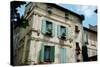 Low Angle View of an Old Building with Flower Pots on Each Window, Rue Des Arenes, Arles-null-Stretched Canvas