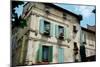 Low Angle View of an Old Building with Flower Pots on Each Window, Rue Des Arenes, Arles-null-Mounted Photographic Print