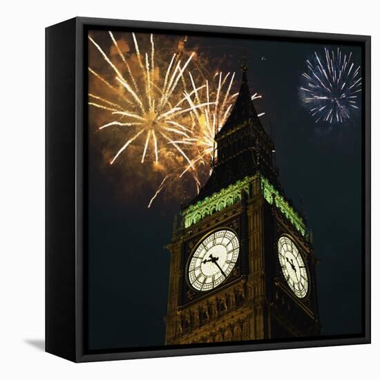 Low angle view of Big Ben, London, England, with fireworks bursting overhead-null-Framed Stretched Canvas