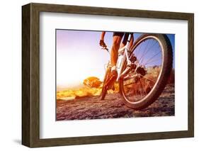 Low Angle View Of Cyclist Riding Mountain Bike On Rocky Trail At Sunrise-warrengoldswain-Framed Photographic Print