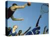 Low Angle View of Group of Young Men Playing Basketball-null-Stretched Canvas