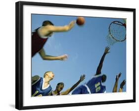 Low Angle View of Group of Young Men Playing Basketball-null-Framed Photographic Print