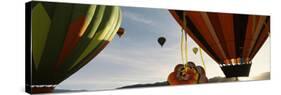Low angle view of hot air balloons in a balloon festival, Taos Balloon Fiesta, Taos, Taos County...-null-Stretched Canvas