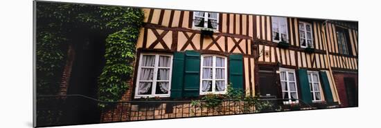 Low angle view of houses, Lyons-la-Foret, Eure, Normandy, France-null-Mounted Photographic Print