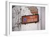 Low angle view of street sign, Calle Crisologo, Vigan, Ilocos Sur, Philippines-null-Framed Photographic Print