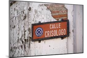 Low angle view of street sign, Calle Crisologo, Vigan, Ilocos Sur, Philippines-null-Mounted Photographic Print