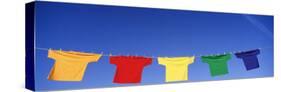 Low Angle View of T-Shirts Hanging on a Clothesline-null-Stretched Canvas