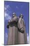 Low Angle View of Two Statues, Red Latvian Riflemen, Riga, Latvia-null-Mounted Giclee Print