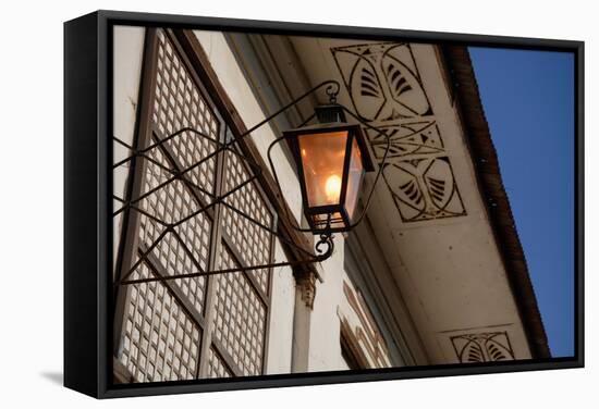 Low angle view of vintage lantern on wall, Vigan, Ilocos Sur, Philippines-null-Framed Stretched Canvas