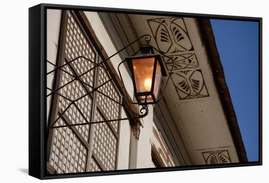 Low angle view of vintage lantern on wall, Vigan, Ilocos Sur, Philippines-null-Framed Stretched Canvas