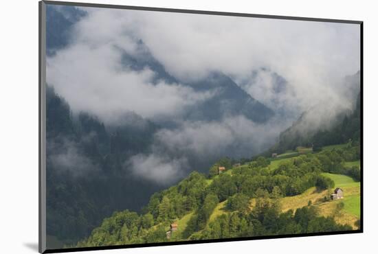 Low Clouds over Meadows Surrounded by Trees, with Small Farm Buildings Near Fliess, Tirol, Austria-Benvie-Mounted Photographic Print