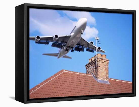 Low-Flying Aircraft Over Rooftops Near London Heathrow Airport, Greater London, England-Mark Mawson-Framed Stretched Canvas