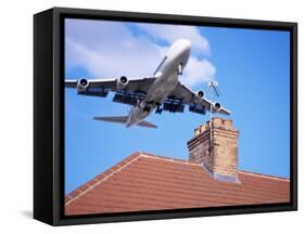 Low-Flying Aircraft Over Rooftops Near London Heathrow Airport, Greater London, England-Mark Mawson-Framed Stretched Canvas