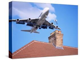 Low-Flying Aircraft Over Rooftops Near London Heathrow Airport, Greater London, England-Mark Mawson-Stretched Canvas