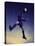 Low Section View of a Soccer Player Jumping in Mid Air to Head a Soccer Ball-null-Stretched Canvas