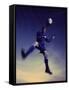 Low Section View of a Soccer Player Jumping in Mid Air to Head a Soccer Ball-null-Framed Stretched Canvas