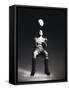 Low Section View of a Soccer Player Jumping in Mid Air to Head a Soccer Ball-null-Framed Stretched Canvas