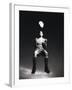 Low Section View of a Soccer Player Jumping in Mid Air to Head a Soccer Ball-null-Framed Photographic Print