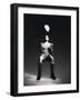 Low Section View of a Soccer Player Jumping in Mid Air to Head a Soccer Ball-null-Framed Photographic Print