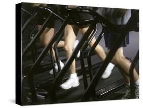 Low Section View of People Running on Treadmills in a Gym-null-Stretched Canvas