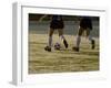 Low Section View of Two Female Soccer Players Kicking a Soccer Ball-null-Framed Premium Photographic Print